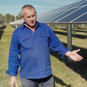 Tony showing a solar installation on farmland